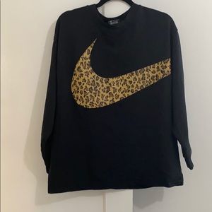 Oversized Nike sweater with cheetah print logo